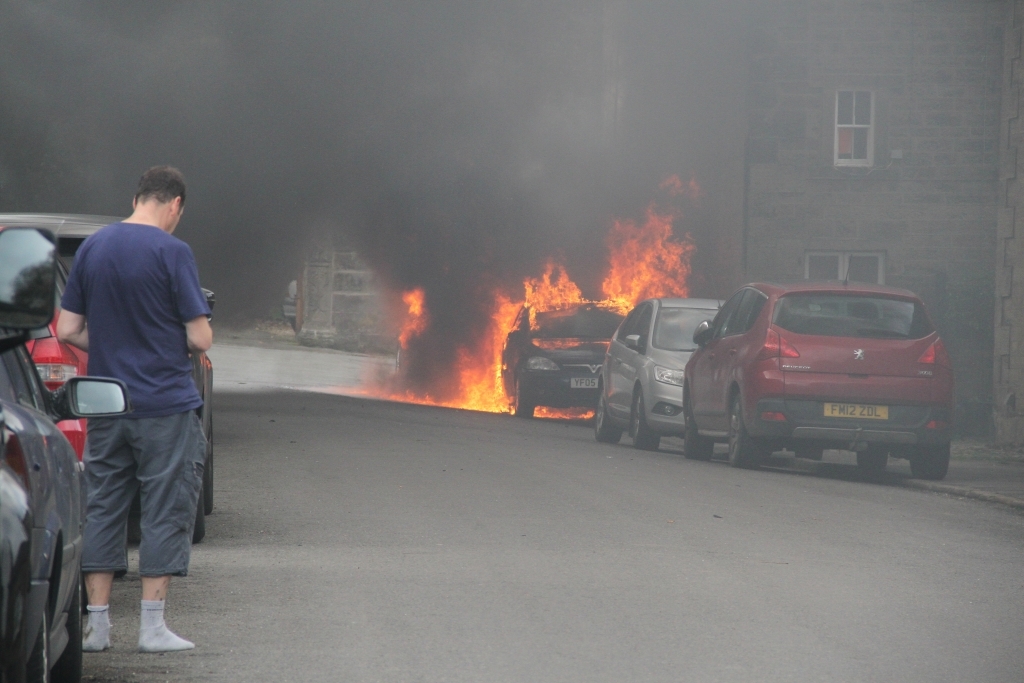 Car on fire in Winster