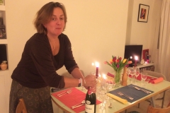 Ruth F-S setting the dinner table