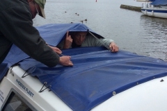 Rain! (It looks as if Colin is shutting John in)