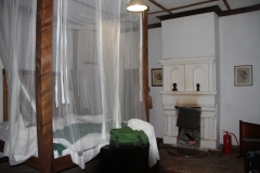 Our bedroom at Shiwa, with a log fire kept in all night